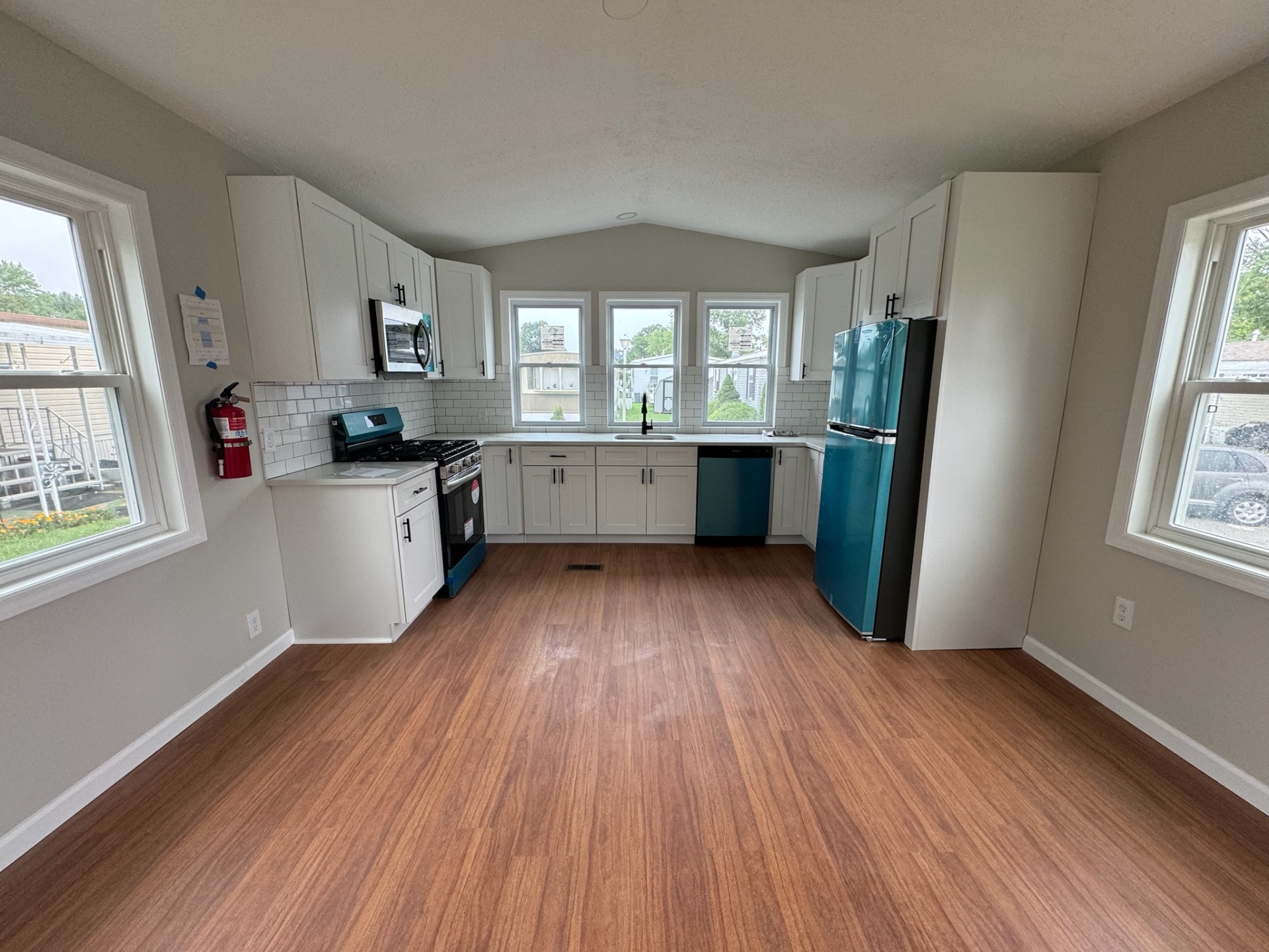 Renovated open kitchen with white cabinets in Jackson NJ