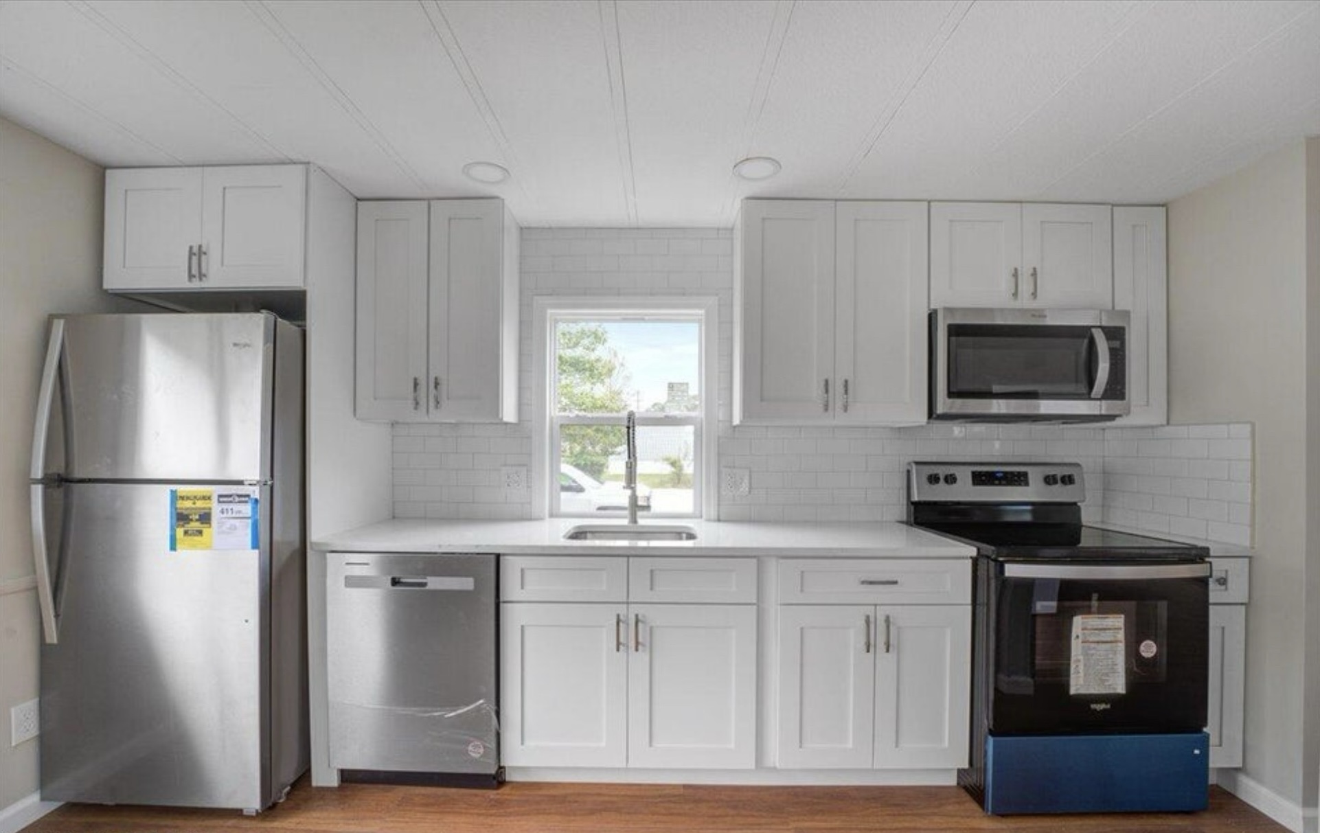Renovated white shaker kitchen with quartz counters in Red Bank NJ