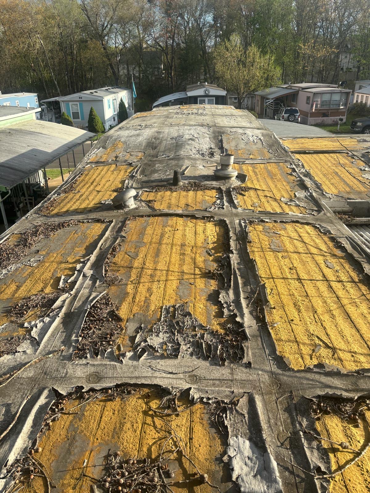 Worn damaged flat roof in Jackson NJ before replacement